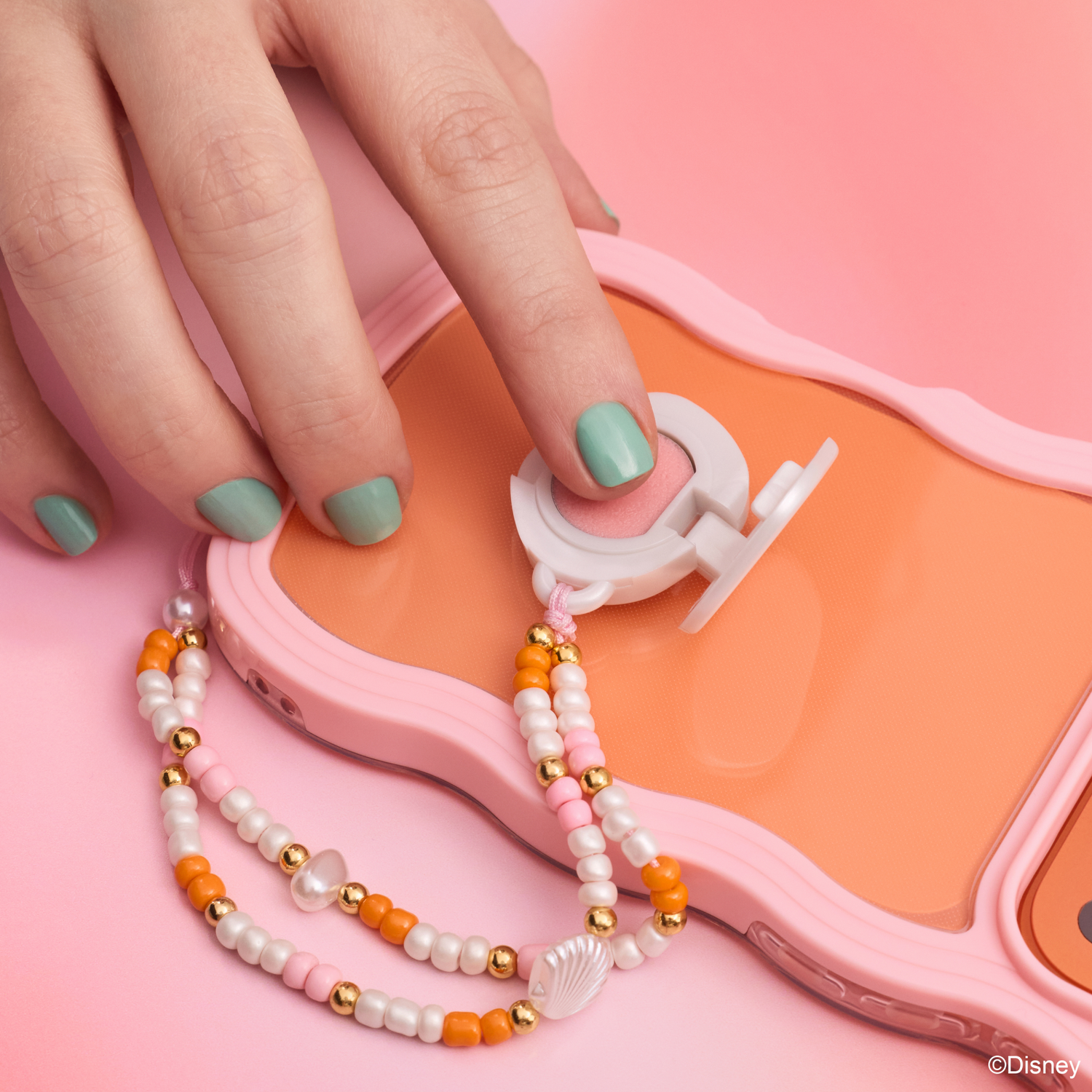 essence Disney THE LITTLE MERMAID Call Me On My Shell huulivoide simpukan muotoinen phone charm